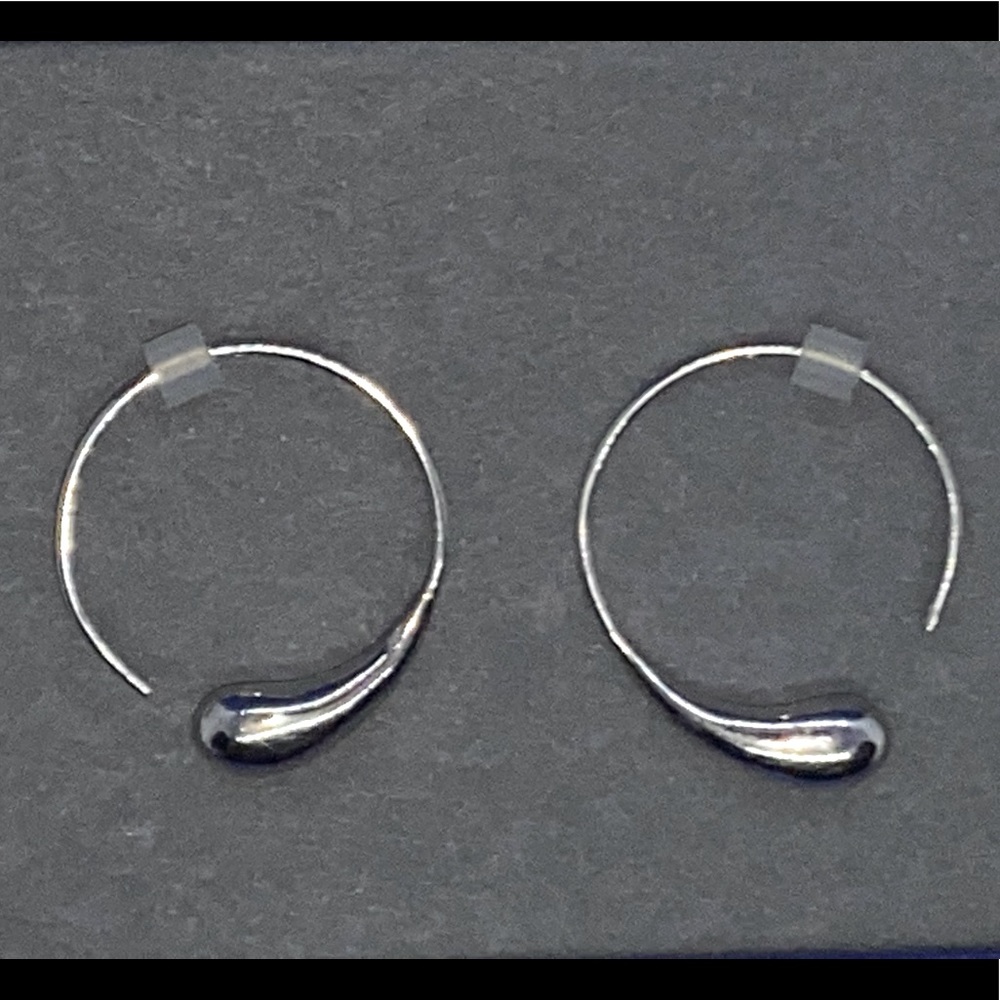 Brand new sterling silver tear drop hoops
